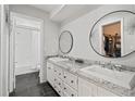 Updated bathroom with double vanity and granite countertops at 6327 2Nd S Ave, St Petersburg, FL 33707