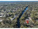 Aerial view showcasing home's waterfront location and neighborhood at 1745 E Mulberry Dr, Tampa, FL 33604