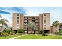 Building exterior showcasing landscaping and walkway at 19725 Gulf Blvd # 501, Indian Shores, FL 33785