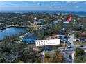 Wide aerial showcasing home's location in the Sunset Park neighborhood at 4820 W San Jose St, Tampa, FL 33629