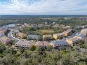 Wide aerial view of the townhome community, highlighting its location at 8958 White Sage Loop, Lakewood Ranch, FL 34202