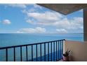 Balcony with partial ocean view and a potted plant at 9 Haig Pl # 707, Dunedin, FL 34698