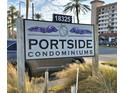 Portside Condominiums sign with building in background at 18325 Gulf Blvd # 407, Redington Shores, FL 33708