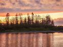 Sunset view over the lake at 20108 Sea Glass Cir, Land O Lakes, FL 34638