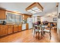 Bright kitchen with light wood cabinets and modern appliances at 37538 New Horizons Blvd, Zephyrhills, FL 33541