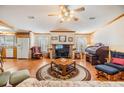 Spacious living room featuring a fireplace and ample seating at 37538 New Horizons Blvd, Zephyrhills, FL 33541