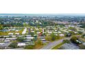 Aerial view showcasing the community's location and proximity to local amenities at 9224 Mission Oaks Blvd, Seminole, FL 33776