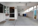 Enclosed front porch with access to the interior and a side entrance at 1205 Chevy Chase Dr, Sun City Center, FL 33573