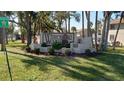 Community entrance sign for Westchester Woods at 22481 Westchester Blvd # A23, Punta Gorda, FL 33980