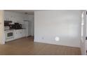 Light and airy living room with wood floors at 3201 Delaware W Ave, Plant City, FL 33563
