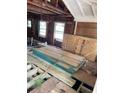Unfinished interior showing exposed floor joists and walls at 615 Newton S Ave, St Petersburg, FL 33701