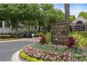 Island Place community entrance with landscaped grounds at 809 Normandy Trace Rd, Tampa, FL 33602