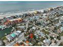 Aerial view showing house location near the water at 13225 2Nd E St, Madeira Beach, FL 33708