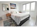 Bright bedroom with comfortable bed and large windows at 1515 Pinellas Bayway S # 70, Tierra Verde, FL 33715