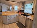 Modern kitchen with butcher block countertops at 4832 Tower, Land O Lakes, FL 34638