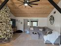 Spacious living area with a cozy sectional sofa at 4832 Tower, Land O Lakes, FL 34638
