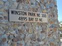 Condo building address sign: Winston Park NE 300, 4895 Bay St NE at 4895 Bay Ne St # 211, St Petersburg, FL 33703