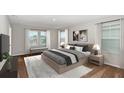 Bright main bedroom with large windows and neutral decor at 14729 Summer Branch Dr, Lithia, FL 33547