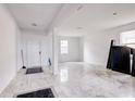 Bright entryway with marble floors and high ceilings at 2420 Allegheny Valley St, Ruskin, FL 33570
