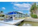 Private boat dock with seating area and waterfront access at 300 Venetian Dr # 7, Clearwater, FL 33755