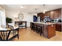 Modern kitchen featuring granite countertops and ample cabinetry at 3116 Winchester Dr, Dunedin, FL 34698