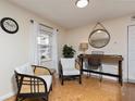 Cozy living area with comfortable seating and cork flooring at 3116 Winchester Dr, Dunedin, FL 34698