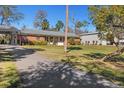 Ranch house with long driveway at 7226 Alafia Ridge Loop, Riverview, FL 33569