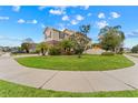 Two-story house with a stone facade, three-car garage, and manicured lawn at 1737 Fox Grape Loop, Lutz, FL 33558