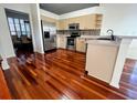 Modern kitchen featuring stainless steel appliances, sleek countertops, and ample cabinet space at 19809 Wyndham Lakes Dr, Odessa, FL 33556