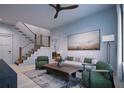 Spacious living room with a staircase and comfortable seating at 2550 1St N Ave, St Petersburg, FL 33713