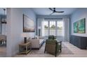 Bright living room with large windows and stylish decor at 2550 1St N Ave, St Petersburg, FL 33713