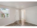 Bright entryway with tiled floors and a view into the living area at 3403 Overland Dr, Holiday, FL 34691