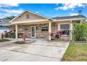 Charming one-story house with stone exterior and a spacious driveway at 8 Citrus Dr, Palm Harbor, FL 34684