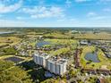 Expansive aerial showcasing Bay Club, golf course, and bay at 2825 Terra Ceia Bay Blvd # 1902, Palmetto, FL 34221