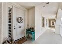 Inviting condo entry with decorative wreath and plant at 2825 Terra Ceia Bay Blvd # 1902, Palmetto, FL 34221