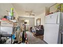 Living room with couch and cluttered floor at 3620 N 55Th St, Tampa, FL 33619