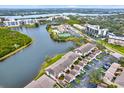 Aerial view of waterfront community with resort-style amenities at 6363 99Th N Way # 12A, St Petersburg, FL 33708