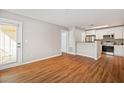 Spacious living room with wood flooring and access to a balcony at 11901 4Th N St # 9105, St Petersburg, FL 33716
