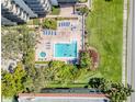 Resort-style pool with plenty of lounge chairs and a hot tub at 2413 Bayshore Blvd # 404, Tampa, FL 33629