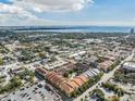 Aerial view showing the community's location, amenities, and surrounding environment, including a waterfront at 410 S Armenia Ave # 926, Tampa, FL 33609