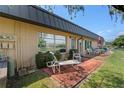 Private patio with seating area, overlooking a tranquil view at 4366 Summersun Dr, New Port Richey, FL 34652
