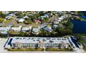 Aerial view of condo complex near water at 4455 Duhme Rd # 304, St Petersburg, FL 33708