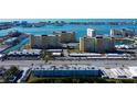 Aerial view of multiple condo buildings and waterfront at 4455 Duhme Rd # 304, St Petersburg, FL 33708
