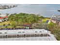 Aerial view of condo building and waterfront at 2700 Bayshore Blvd # 6308, Dunedin, FL 34698