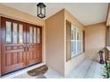 Inviting entryway with double doors and tiled flooring at 2913 Aston Ave, Plant City, FL 33566