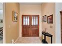 Interior entryway with double doors and hardwood floor at 2913 Aston Ave, Plant City, FL 33566