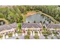Townhomes community nestled around a pond at 11902 Greengate Dr, Hudson, FL 34669