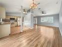 Open kitchen with light-colored cabinetry and tiled floors at 10454 Ventura Dr, Spring Hill, FL 34608