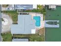 Bird's eye view showing home, pool, and private dock at 11185 5Th E St, Treasure Island, FL 33706