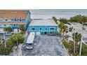 Beachfront property aerial view, showing building and RV parking at 18838 Gulf Blvd # 202, Indian Shores, FL 33785